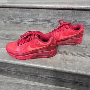 Nike Air Max 90 "City Special - Chicago" sneaker in a triple red colorway. youth